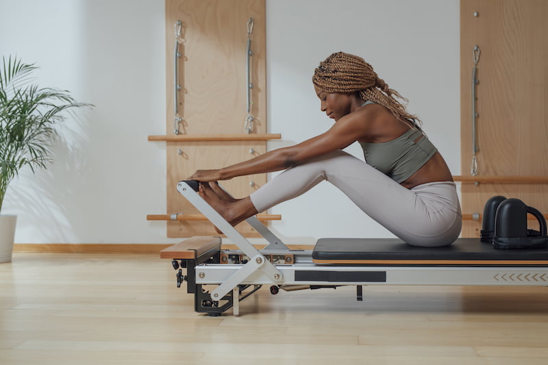 Woman doing a Reformer exercise
